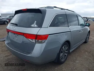 2016 Honda Odyssey Touring Elite with VIN 5FNRL5H99GB107896, listed as a IAAI auction lot 42040395 with 162,120 mi miles and . Bid and sale history available at carsss.com. Image 4.