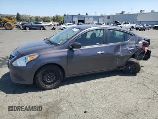 2015 Nissan Versa SV with VIN 3N1CN7AP7FL954584, listed as a Copart auction lot 61295745 with 109,411 mi miles and Salvage title. Bid and sale history available at DreamBid. Image 1.