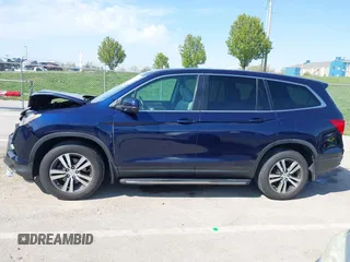 2016 Honda Pilot EX-L with VIN 5FNYF6H53GB078174, listed as a IAAI auction lot 42053669 with 94,259 mi miles and . Bid and sale history available at DreamBid. Image 14.