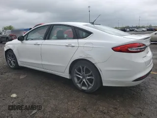 2017 Ford Fusion SE z VIN 3FA6P0H72HR241423, wystawiony jako Copart lot #56777945 z przebiegiem 105 223 mil mil oraz Czysty tytuł • Clean title. Historia ofert i sprzedaży dostępna na DreamBid. Obrazek 2.