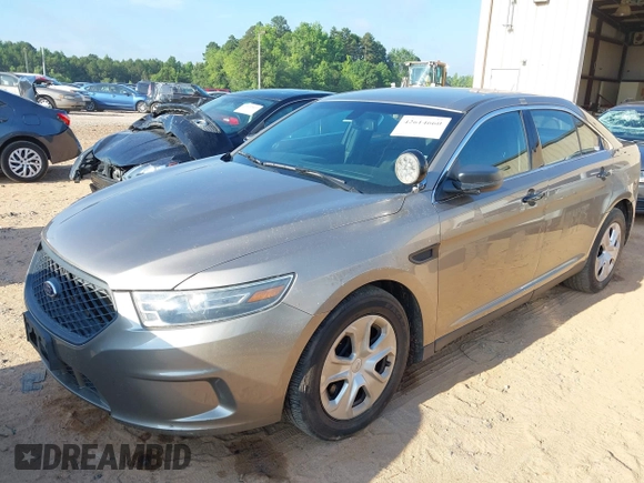 2015 Ford Police Interceptor z VIN 1FAHP2MK2FG135699, wystawiony jako IAAI lot #42614660 z przebiegiem 113 927 mil mil oraz . Historia ofert i sprzedaży dostępna na DreamBid. Obrazek 2.
