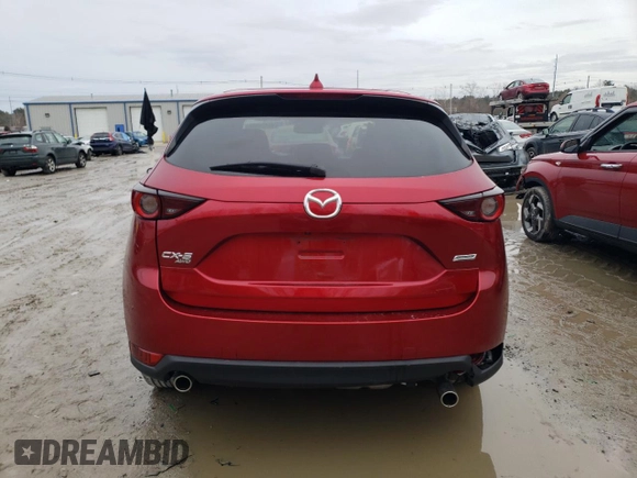 2019 Mazda CX-5 Touring with VIN JM3KFBCMXK0632631, listed as a Copart auction lot 45414485 with 80,795 mi miles and Salvage Title. Bid and sale history available at DreamBid. Image 6.