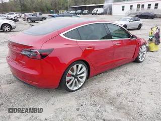 2018 Tesla Model 3 Long Range Battery with VIN 5YJ3E1EB7JF055384, listed as a IAAI auction lot 41924325 with 52,039 mi miles and . Bid and sale history available at DreamBid. Image 4.