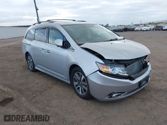 2014 Honda Odyssey Touring with VIN 5FNRL5H93EB066162, listed as a IAAI auction lot 41734783 with 173,063 mi miles and . Bid and sale history available at DreamBid. Image 1.