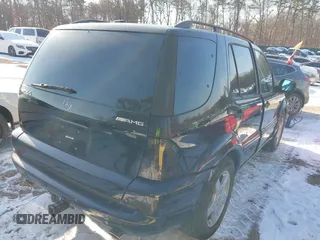 2001 Mercedes-Benz M-Class AMG with VIN 4JGAB74E71A255572, listed as a IAAI auction lot 41415938 with 78,185 mi miles. Bid and sale history available at carsss.com. Image 4.