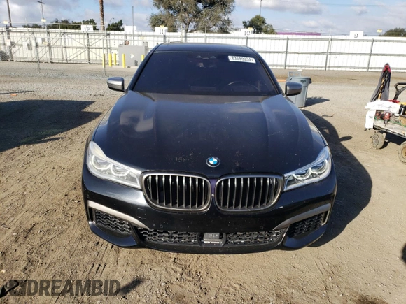 2018 BMW 7 Series M760i xDrive with VIN WBA7H6C50JG614781, listed as a Copart auction lot 83689234 with 49,873 mi miles and Salvage Title. Bid and sale history available at carsss.com. Image 5.