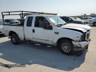 2001 Ford Super Duty F-250 XL with VIN 1FTNX20L01EC17379, listed as a Copart auction lot 74730024 with 309,556 mi miles and Salvage Title. Bid and sale history available at carsss.com. Image 4.