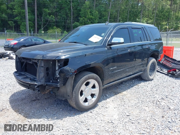 2015 Chevrolet Tahoe LTZ z VIN 1GNSCCKC8FR121461, wystawiony jako IAAI lot #42407901 z przebiegiem 137 729 mil mil oraz . Historia ofert i sprzedaży dostępna na DreamBid. Obrazek 18.