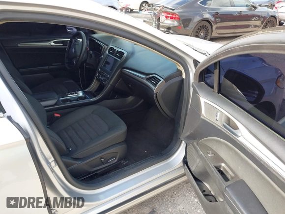 2018 Ford Fusion SE z VIN 3FA6P0LU2JR281231, wystawiony jako IAAI lot #41963083 z przebiegiem 115 434 mil mil oraz . Historia ofert i sprzedaży dostępna na DreamBid. Obrazek 5.