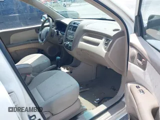2007 Kia Sportage LX z VIN KNDJF724877333978, wystawiony jako IAAI lot #42405374 z przebiegiem 167 512 mil mil oraz . Historia ofert i sprzedaży dostępna na DreamBid. Obrazek 5.