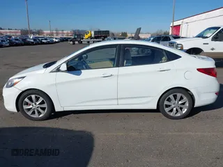 2012 Hyundai Accent GLS with VIN KMHCU4AE3CU246908, listed as a IAAI auction lot 41696958 with 175,164 mi miles. Bid and sale history available at carsss.com. Image 14.