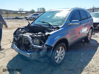 2008 Honda CR-V EX-L with VIN JHLRE38788C030498, listed as a IAAI auction lot 41761233 with 214,418 mi miles. Bid and sale history available at carsss.com. Image 2.