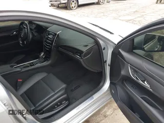 2014 Cadillac ATS Standard AWD with VIN 1G6AG5RX9E0179422, listed as a IAAI auction lot 41826487 with 121,061 mi miles and . Bid and sale history available at carsss.com. Image 5.