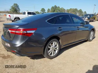 2014 Toyota Avalon Limited z VIN 4T1BK1EB9EU107787, wystawiony jako IAAI lot #41826625 z przebiegiem 78 718 mil mil oraz . Historia ofert i sprzedaży dostępna na DreamBid. Obrazek 4.