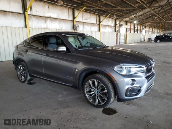 2015 BMW X6 xDrive35i with VIN 5UXKU2C59F0N77312, listed as a Copart auction lot 63591123 with 121,105 mi miles. Bid and sale history available at carsss.com. Image 4.
