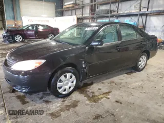 2002 Toyota Camry LE z VIN 4T1BE32K52U559884, wystawiony jako Copart lot #57978715 z przebiegiem 140 595 mil mil oraz Szkoda całkowita • Salvage title. Historia ofert i sprzedaży dostępna na DreamBid. Obrazek 1.