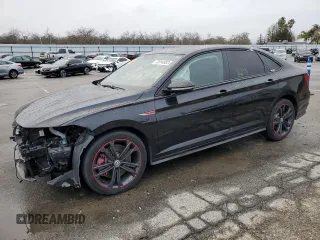 2019 Volkswagen Jetta GLI S z VIN 3VW6T7BU1KM147158, wystawiony jako Copart lot #72814922 z przebiegiem 19 109 mil mil oraz . Historia ofert i sprzedaży dostępna na DreamBid. Obrazek 1.