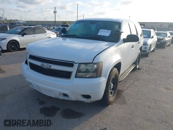 2008 Chevrolet Tahoe Police with VIN 1GNEC03088R276742, listed as a IAAI auction lot 41753762 with 86,095 mi miles and . Bid and sale history available at DreamBid. Image 2.