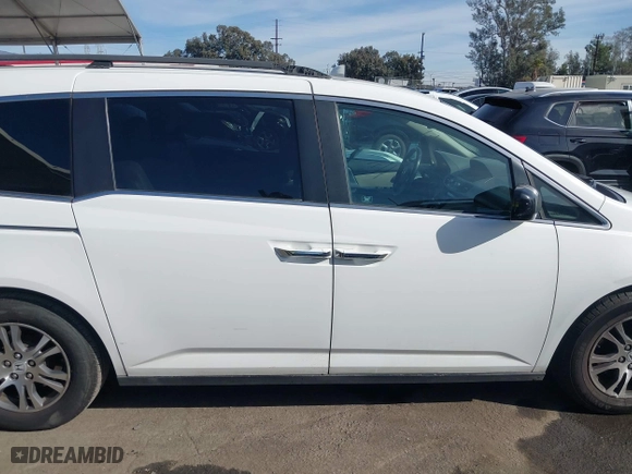 2011 Honda Odyssey EX-L with VIN 5FNRL5H67BB007777, listed as a IAAI auction lot 41402903 with 210,921 mi miles. Bid and sale history available at carsss.com. Image 14.