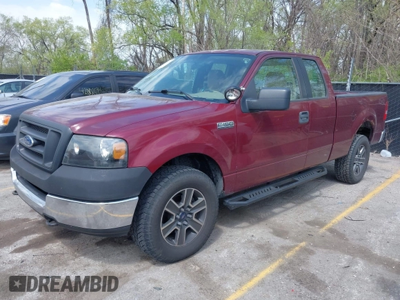 2005 Ford F-150 XLT with VIN 1FTPX14575KD79404, listed as a IAAI auction lot 42003073 with 212,050 mi miles. Bid and sale history available at carsss.com. Image 2.