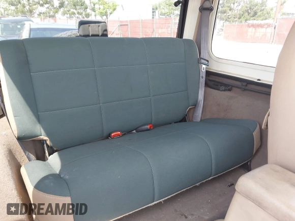 2001 Jeep Wrangler Sahara with VIN 1J4FA59SX1P337951, listed as a IAAI auction lot 42087134 with 154,479 mi miles and . Bid and sale history available at DreamBid. Image 8.