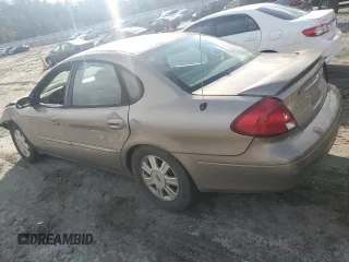 2003 Ford Taurus SEL Deluxe with VIN 1FAHP56SX3A243775, listed as a Copart auction lot 72245394 with 251,041 mi miles and Salvage Title. Bid and sale history available at DreamBid. Image 2.