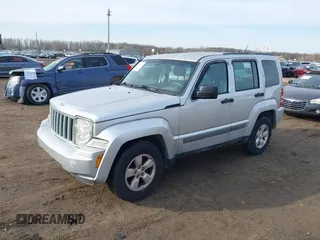 2012 Jeep Liberty Sport with VIN 1C4PJMAKXCW133658, listed as a IAAI auction lot 41814977 with 128,328 mi miles and . Bid and sale history available at carsss.com. Image 2.