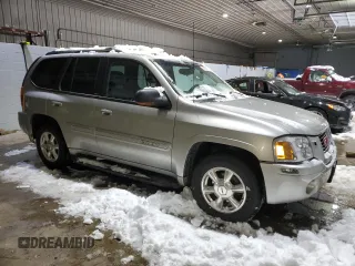 2005 GMC Envoy SLT with VIN 1GKDT13SX52287052, listed as a Copart auction lot 44387855 with 0 mi miles and Salvage Title. Bid and sale history available at carsss.com. Image 4.