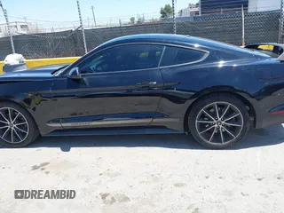 2015 Ford Mustang EcoBoost z VIN 1FA6P8TH6F5382719, wystawiony jako IAAI lot #42316250 z przebiegiem 119 412 mil mil oraz . Historia ofert i sprzedaży dostępna na DreamBid. Obrazek 14.
