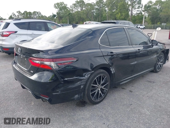 2021 Toyota Camry SE Nightshade with VIN 4T1G11AK2MU471174, listed as a IAAI auction lot 41740546 with 77,037 mi miles. Bid and sale history available at carsss.com. Image 4.