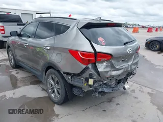 2014 Hyundai Santa Fe with VIN 5XYZU3LB2EG155127, listed as a IAAI auction lot 41864518 with Not provided miles and . Bid and sale history available at DreamBid. Image 3.
