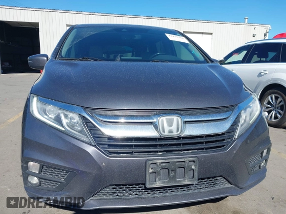 2018 Honda Odyssey EX-L z VIN 5FNRL6H7XJB067694, wystawiony jako IAAI lot #42177338 z przebiegiem 159 670 mil mil oraz . Historia ofert i sprzedaży dostępna na DreamBid. Obrazek 13.