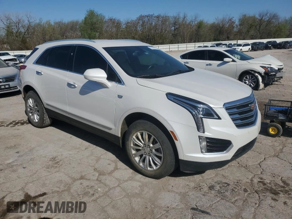 2018 Cadillac XT5 FWD with VIN 1GYKNARS1JZ172873, listed as a Copart auction lot 52168115 with 102,133 mi miles and Salvage title. Bid and sale history available at DreamBid. Image 4.