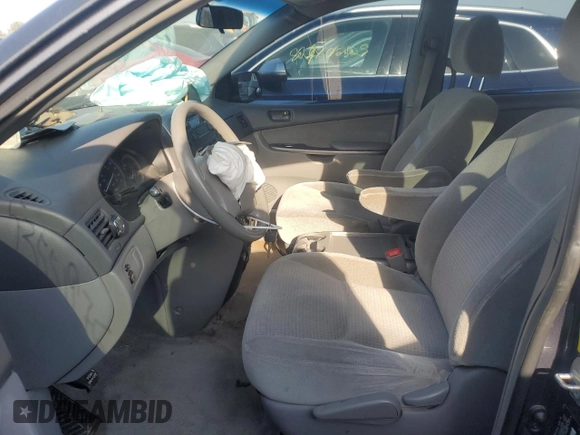 2010 Toyota Sienna CE with VIN 5TDKK4CC9AS340097, listed as a Copart auction lot 53551975 with 172,825 mi miles and Salvage Title. Bid and sale history available at DreamBid. Image 7.