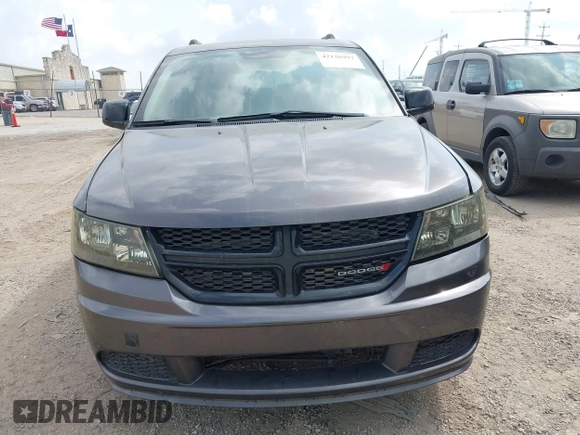2019 Dodge Journey SE with VIN 3C4PDCBBXKT860142, listed as a IAAI auction lot 42126997 with 101,675 mi miles and . Bid and sale history available at DreamBid. Image 12.