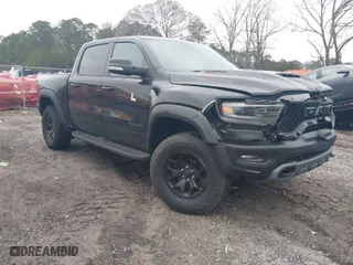 2022 Ram 1500 TRX with VIN 1C6SRFU9XNN476106, listed as a IAAI auction lot 41627895 with 21,992 mi miles. Bid and sale history available at carsss.com. Image 1.