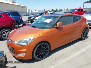 2012 Hyundai Veloster w/Black Int z VIN KMHTC6AD4CU049722, wystawiony jako IAAI lot #42594609 z przebiegiem 72 324 mil mil oraz . Historia ofert i sprzedaży dostępna na DreamBid. Obrazek 2.