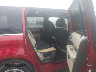 2014 Ford Flex SEL z VIN 2FMGK5C8XEBD19494, wystawiony jako IAAI lot #42202062 z przebiegiem 180 985 mil mil oraz . Historia ofert i sprzedaży dostępna na DreamBid. Obrazek 8.