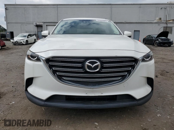 2016 Mazda CX-9 Touring z VIN JM3TCACY6G0109480, wystawiony jako Copart lot #59966965 z przebiegiem 90 433 mil mil oraz Czysty tytuł • Clean title. Historia ofert i sprzedaży dostępna na DreamBid. Obrazek 5.