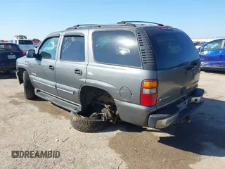 2002 Chevrolet Tahoe LT with VIN 1GNEC13Z12J233208, listed as a IAAI auction lot 41659873 with 238,922 mi miles and . Bid and sale history available at DreamBid. Image 3.