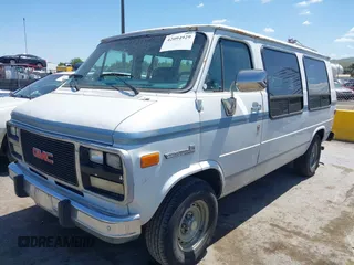 1993 GMC Vandura z VIN 1GDEG25K8PF505973, wystawiony jako IAAI lot #42094929 z przebiegiem 207 036 mil mil oraz . Historia ofert i sprzedaży dostępna na DreamBid. Obrazek 2.
