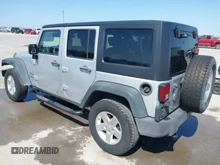 2010 Jeep Wrangler Unlimited Sport with VIN 1J4BA3H17AL211887, listed as a IAAI auction lot 41778324 with 185,626 mi miles. Bid and sale history available at carsss.com. Image 3.