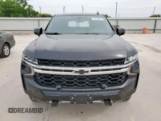 2023 Chevrolet Tahoe Commercial with VIN 1GNSCLED7PR428027, listed as a Copart auction lot 56738455 with 6,599 mi miles and Salvage title. Bid and sale history available at DreamBid. Image 5.