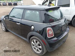 2010 MINI Hardtop S with VIN WMWMF7C52ATZ69084, listed as a IAAI auction lot 42576294 with Not provided miles and . Bid and sale history available at DreamBid. Image 3.
