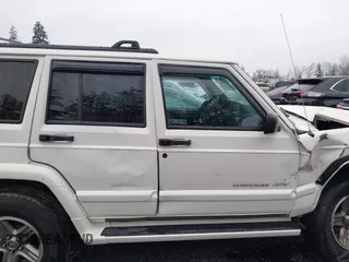 2000 Jeep Cherokee Classic with VIN 1J4FF58S4YL136213, listed as a IAAI auction lot 41227447 with 327,570 mi miles. Bid and sale history available at carsss.com. Image 13.