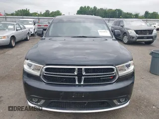 2014 Dodge Durango SXT with VIN 1C4RDJAG7EC307118, listed as a IAAI auction lot 42168781 with 92,977 mi miles and . Bid and sale history available at DreamBid. Image 12.