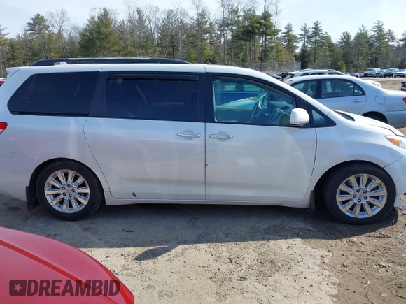 2011 Toyota Sienna XLE AAS with VIN 5TDYK3DC7BS054012, listed as a IAAI auction lot 41752182 with 123,226 mi miles and . Bid and sale history available at DreamBid. Image 13.