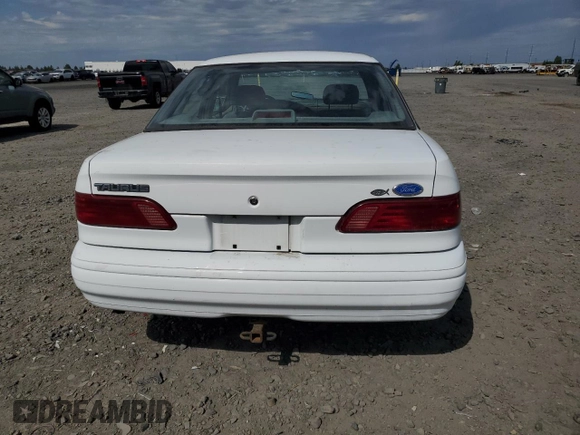 1993 Ford Taurus z VIN 1FALP5348PG189055, wystawiony jako Copart lot #58589175 z przebiegiem 45 421 mil mil oraz Tytuł czysty. Historia ofert i sprzedaży dostępna na DreamBid. Obrazek 6.