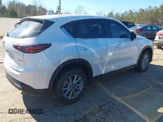 2023 Mazda CX-5 2.5 S Preferred Package with VIN JM3KFBCM6P0140427, listed as a IAAI auction lot 41335811 with 42,713 mi miles. Bid and sale history available at carsss.com. Image 4.