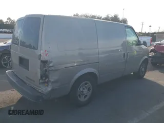 2005 Chevrolet Astro Cargo Van with VIN 1GCDM19X45B130922, listed as a IAAI auction lot 41196801 with 125,309 mi miles. Bid and sale history available at carsss.com. Image 4.